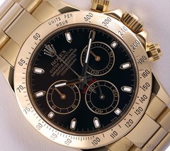 Rolex Daytona 40mm 116528 18K Yellow Gold Black Dial Chronograph Oyster Band