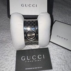 Gucci Twirl GG Brown Dial Silver Bangle Watch YA112401