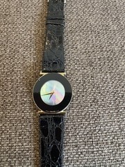 Movado women’s watch. Mother Of Pearl Face. Black Leather Strap