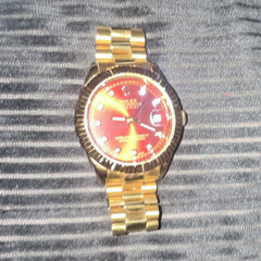 Rolex Datejust Red Dial Diamond Markers Fluted Gold Bezel Date Automatic