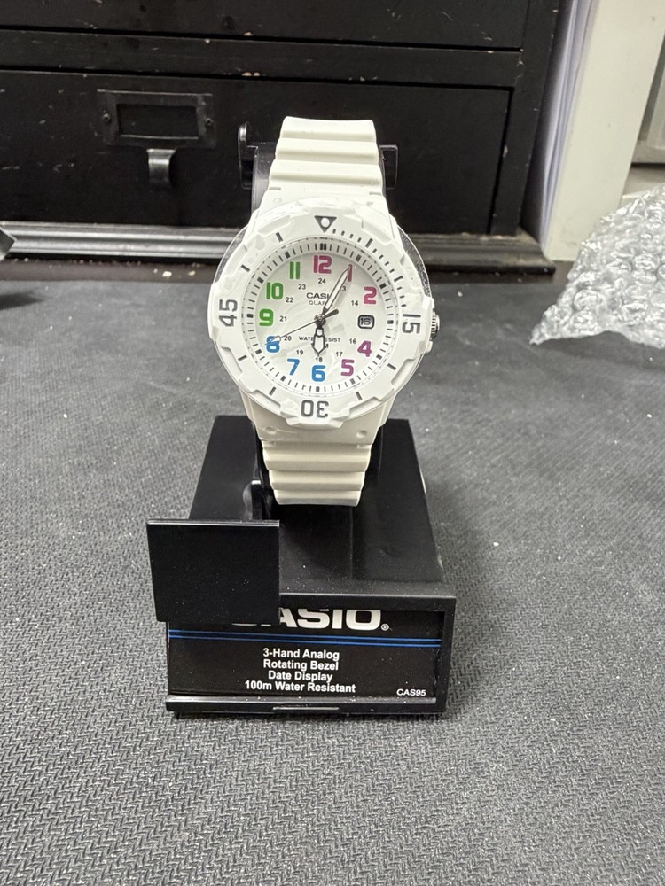 NWT Casio LRW-200H White Rainbow Dial Rotating Bezel 100M Box Papers