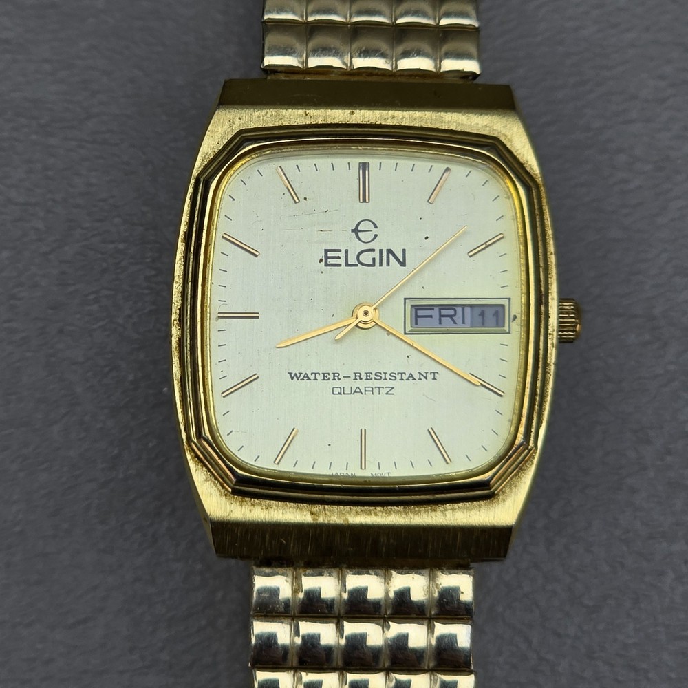 Elgin Mens Quartz Watch Day Date English Spanish FC 206 012 Stretch Band
