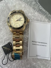 Akribos XXIV Men’s Quartz Diver Watch 46mm Gold Dial Black Bezel Day/Date 50m