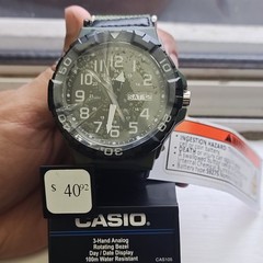 Casio Analog Quartz Watch 100m Rotating Bezel Day/Date Green Camo Dial 50mm