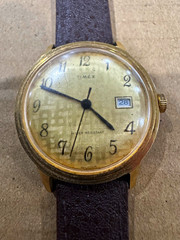 Timex Manual Wind 15J Water Resistant Date Gold Dial Gold Case Leather 35mm