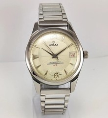 Working Melas Pearl Dial Date Function Handwinding Transparent Back Wrist Watch