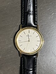 Bulova Dress Watch Gold Tone Case Champagne Dial new battery new strap