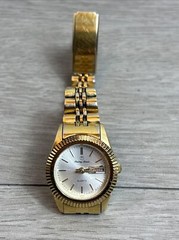 Mathey Tissot Woman’s Watch Gold Tone English And Spanish Days Stainless Quarts