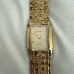 Vintage Elgin Men’s Gold-Tone Tank Watch with Diamond Accent – Model FG286NB
