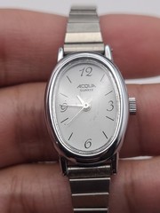 Acqua Watch Oval Case Stretch Band Womens Quartz Analog Silver Tone Working